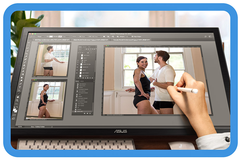 Image of graphic designer manipulating an image on a tablet